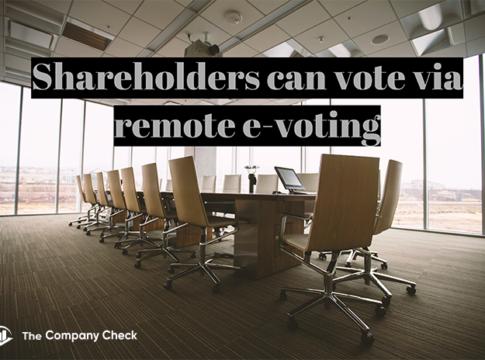 Empty boardroom with a long table and chairs, titled Shareholders can vote via remote e-voting